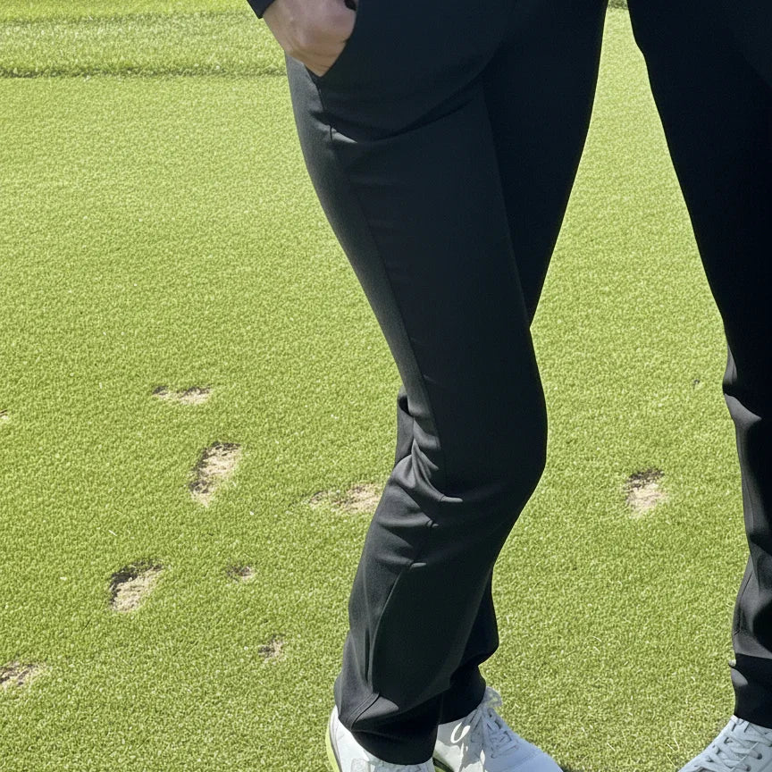 Detalle pantalon tecnico negro golf mujer