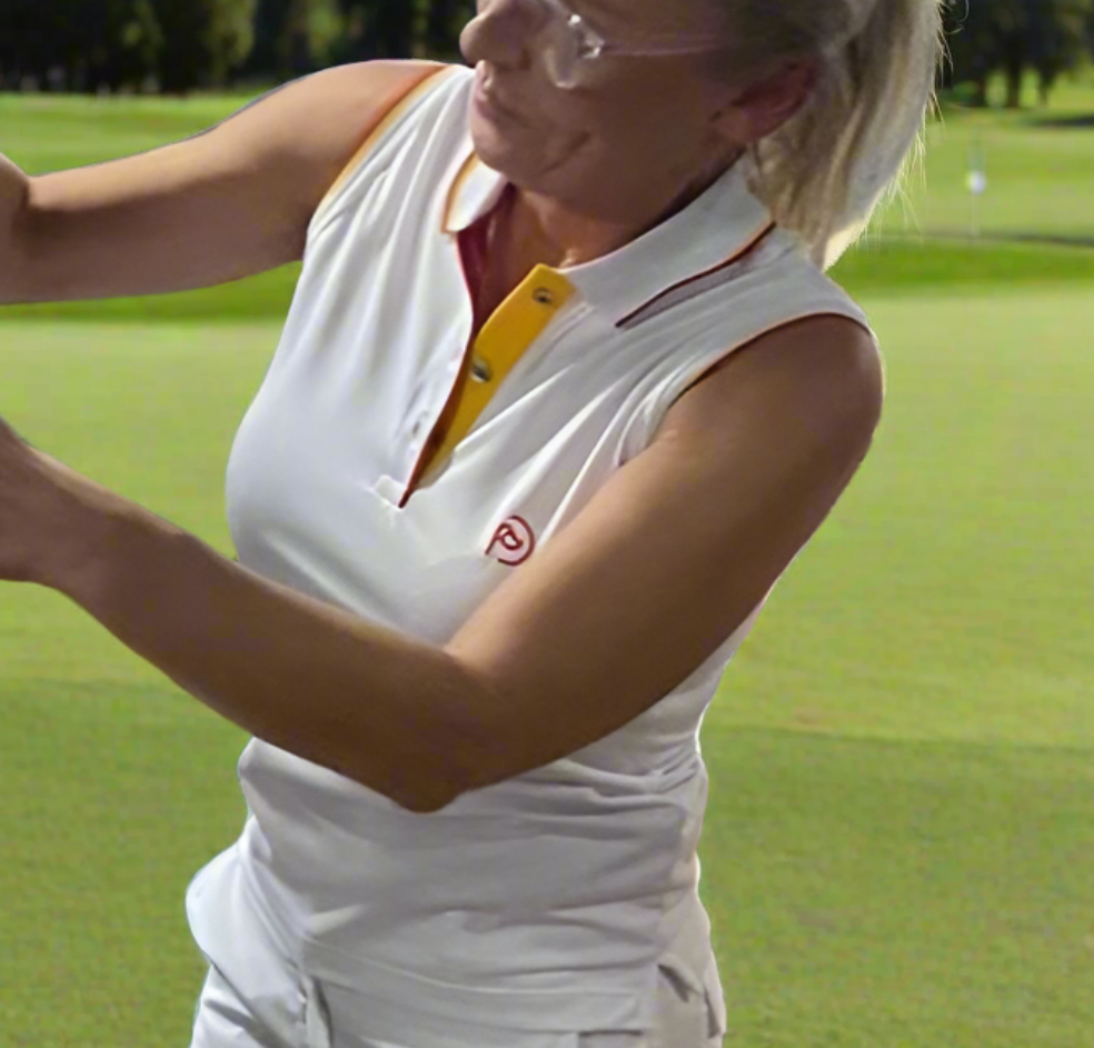Polo técnico golf blanco, mujer. ¡Con sutiles toques de España!