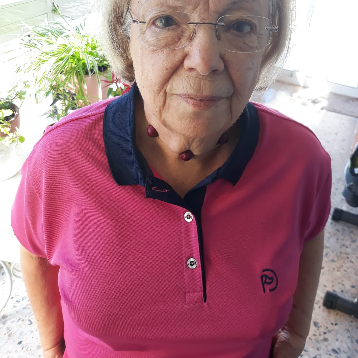 Polo fucsia para mama proteccion solar