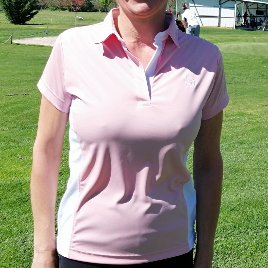 Polo de golf rosa y blanco, UPF 50+, mujer