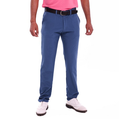 Conjunto pantalón técnico golf petróleo y polo de golf fucsia, cuello camisero