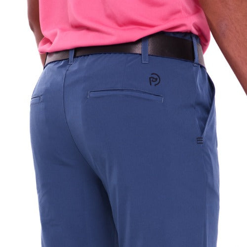 Detalle pantalón golf azul petróleo
