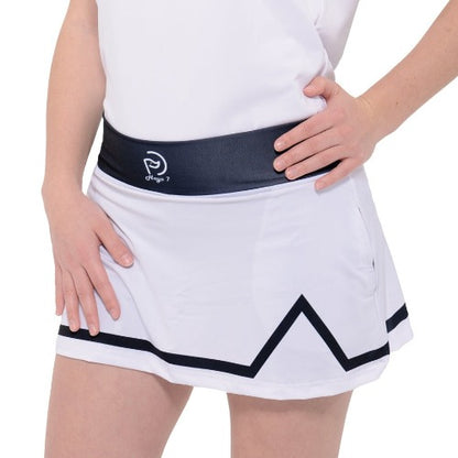 Falda de golf con pantalón interior. Color blanco con detalles en azul marino